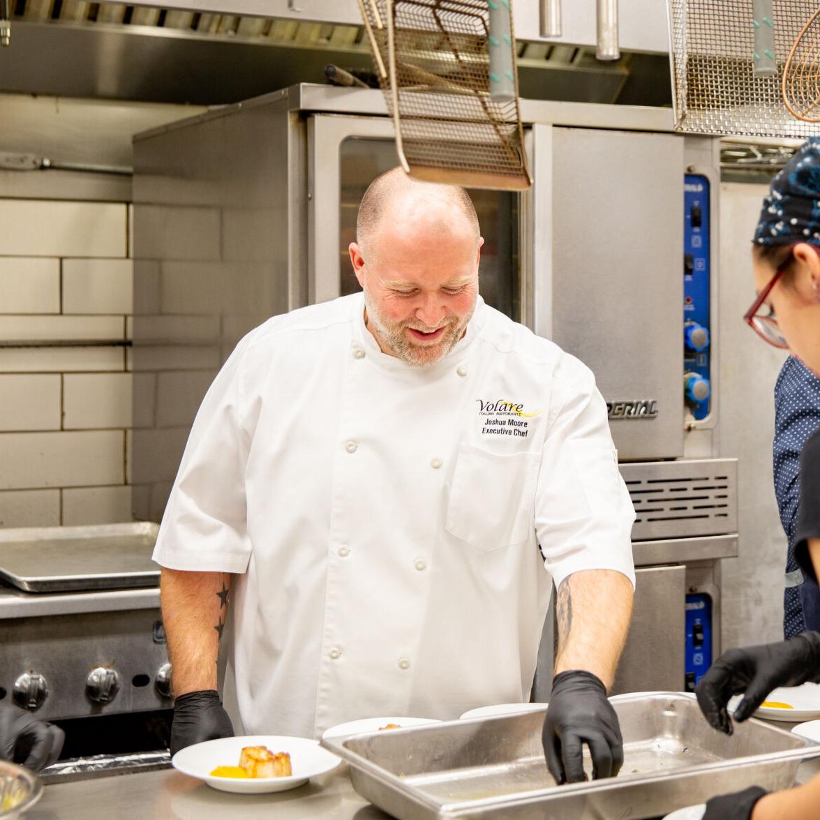 Joshua Moore, executive chef at Volare, during Blessings in a Backpack celebrity chef dinner - 2.20.24
